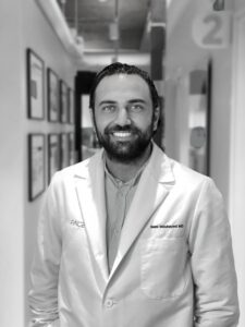 Dr Moubayed BLURRED NAME TAG BLACK WHITE